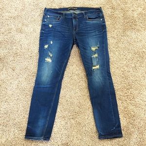 Express distressed mid rise legging jean, size 14